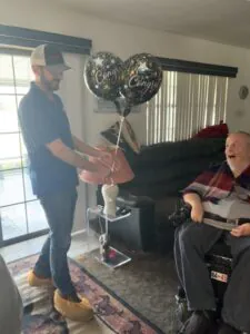Robert receiving the giveaway announcement